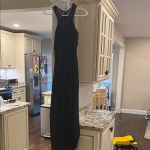 Elegant Black maxi dress with crochet bottom and side parts